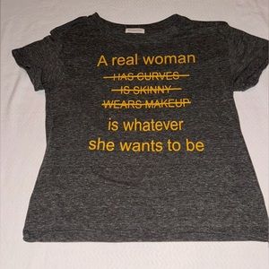 A woman is… tee